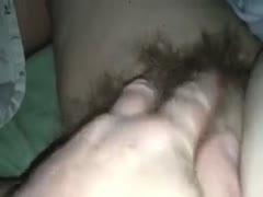 Rubbing my wife's hirsute snatch in front of a camera 